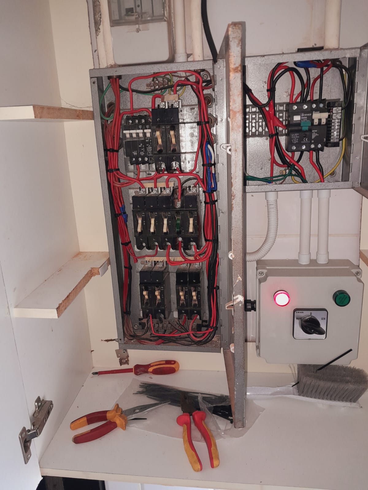 Distribution board with mains and generator changeover switch wired and labelled